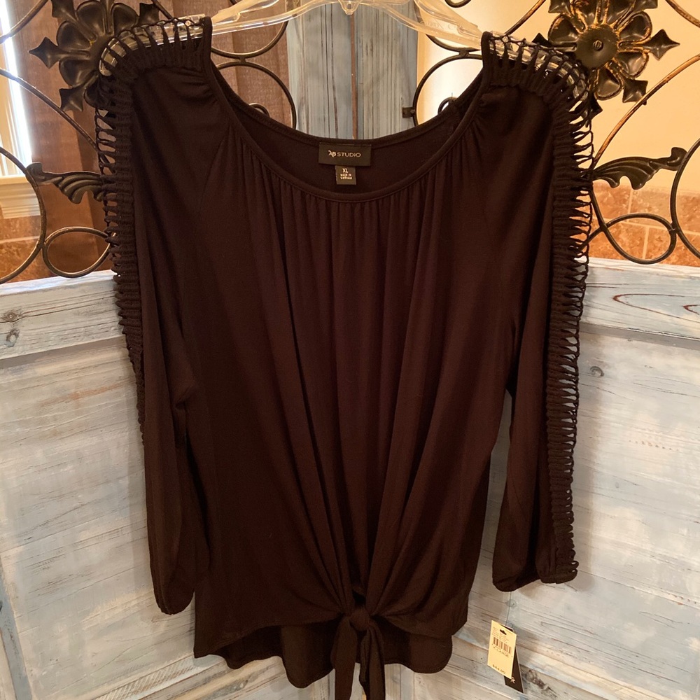 AB studios black top with detailing on sleeve. XL.